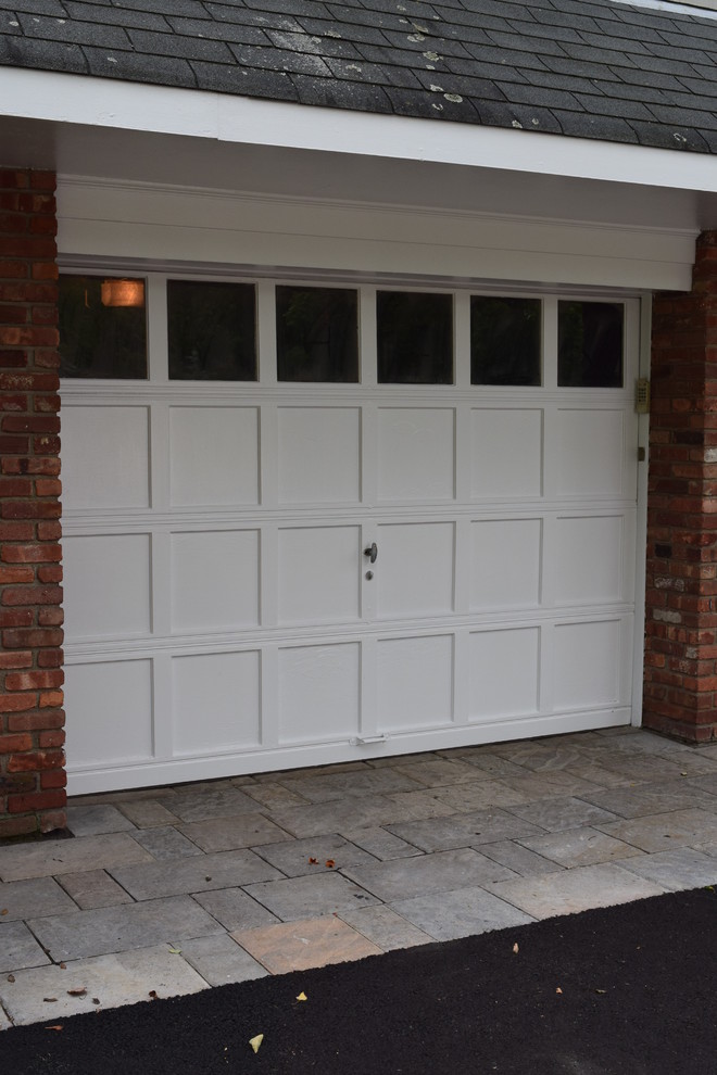 This is an example of a mid-sized country attached two-car garage in New York.