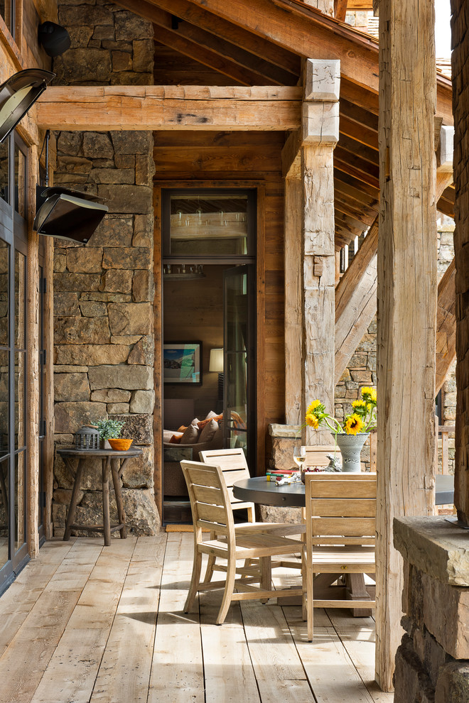 Deck - huge rustic backyard deck idea with no cover