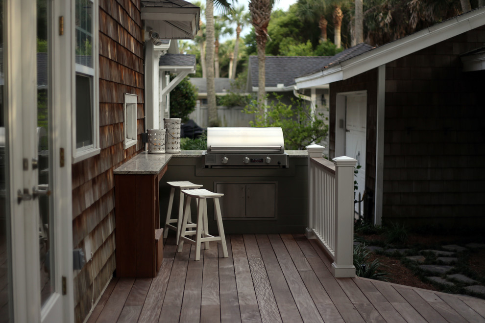 Design ideas for a small beach style backyard patio in Jacksonville with an outdoor kitchen, decking and no cover.