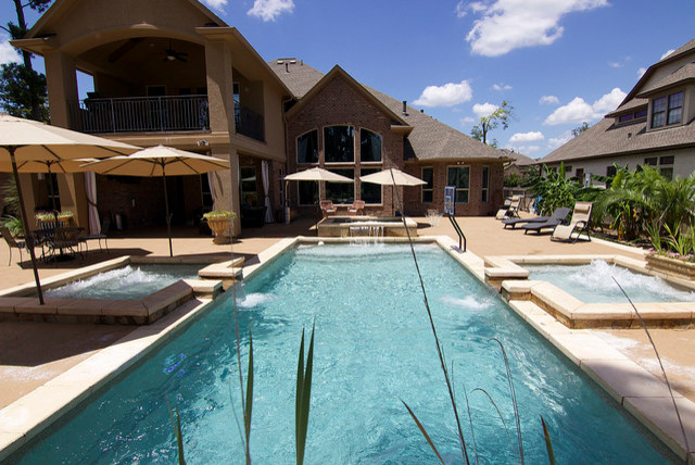 Pool - large indoor stamped concrete and rectangular indoor pool idea in Austin