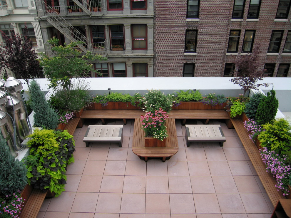 Contemporary backyard patio in New York.