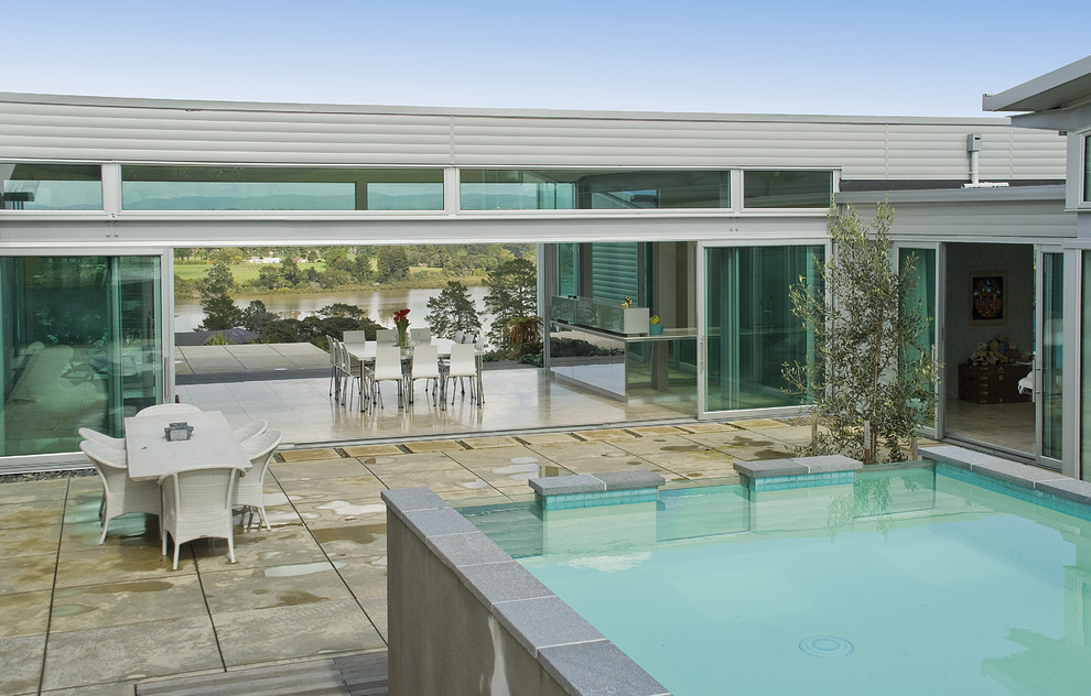 Inspiration for a contemporary rectangular aboveground pool in Auckland.