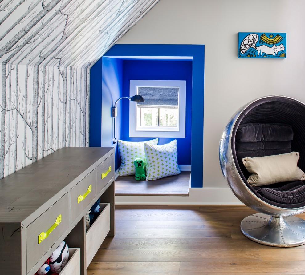 Inspiration for a beach style kids' playroom in Atlanta with multi-coloured walls and medium hardwood floors.