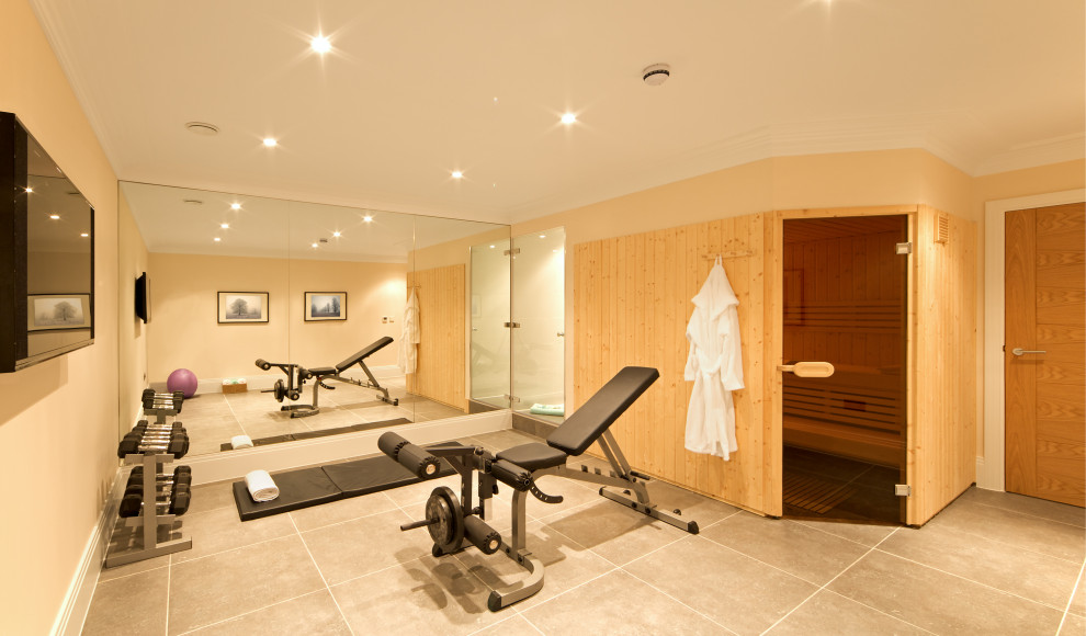 Photo of a contemporary home gym in Surrey.