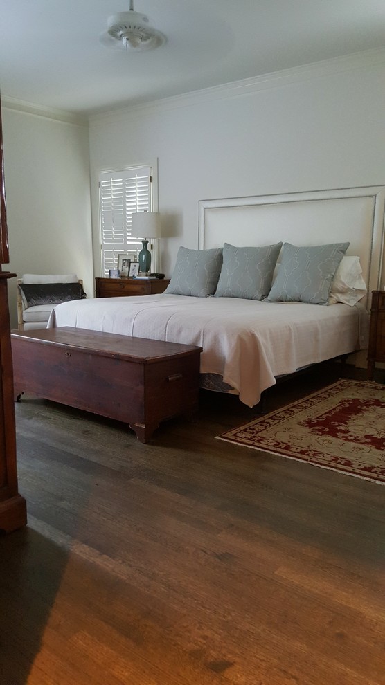 Mid-sized transitional master bedroom in Birmingham with white walls, medium hardwood floors and no fireplace.