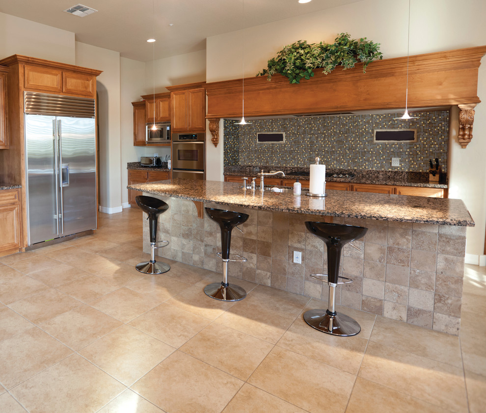 Eat-in kitchen - large transitional porcelain tile eat-in kitchen idea in Atlanta with an undermount sink, beaded inset cabinets, medium tone wood cabinets, granite countertops, multicolored backsplash, stainless steel appliances and an island