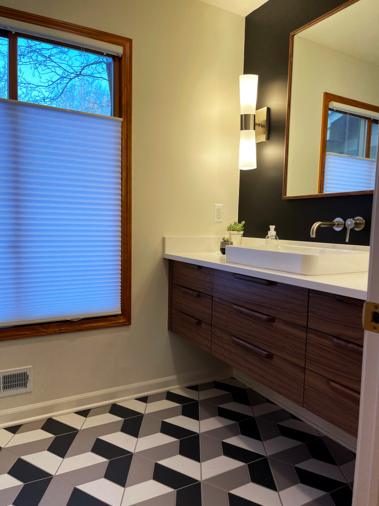 Example of a mid-sized mid-century modern powder room design in Detroit