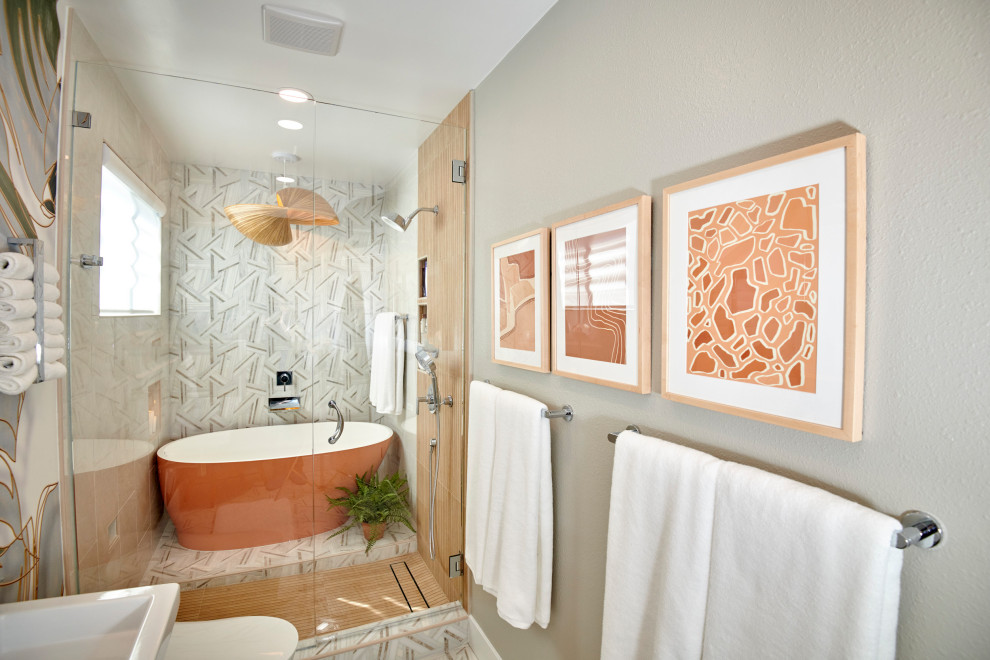 Design ideas for a mid-sized tropical master wet room bathroom in Denver with white cabinets, a freestanding tub, a bidet, white tile, marble, multi-coloured walls, marble floors, a trough sink, white floor, a hinged shower door, white benchtops, a niche, a double vanity, a floating vanity, wallpaper and panelled walls.