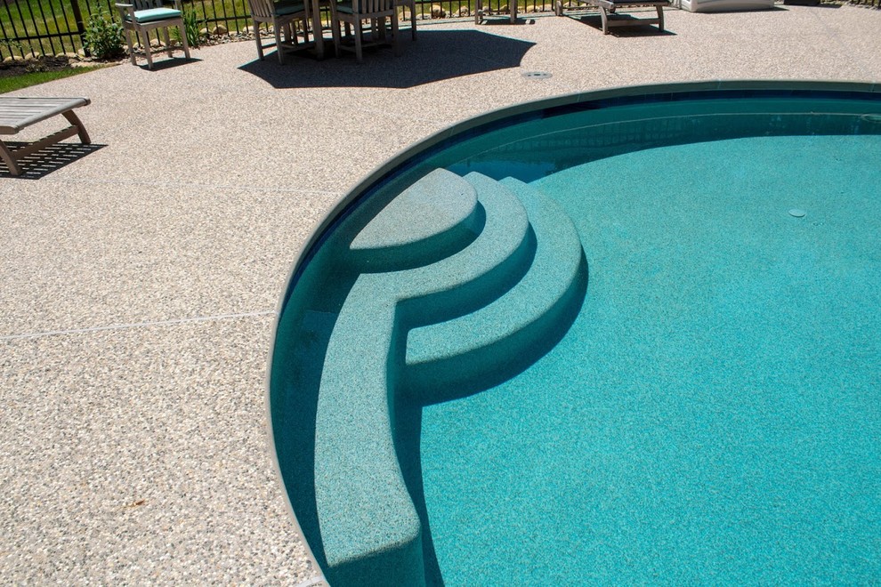 Pool house - mid-sized transitional backyard custom-shaped and decomposed granite lap pool house idea in Boston