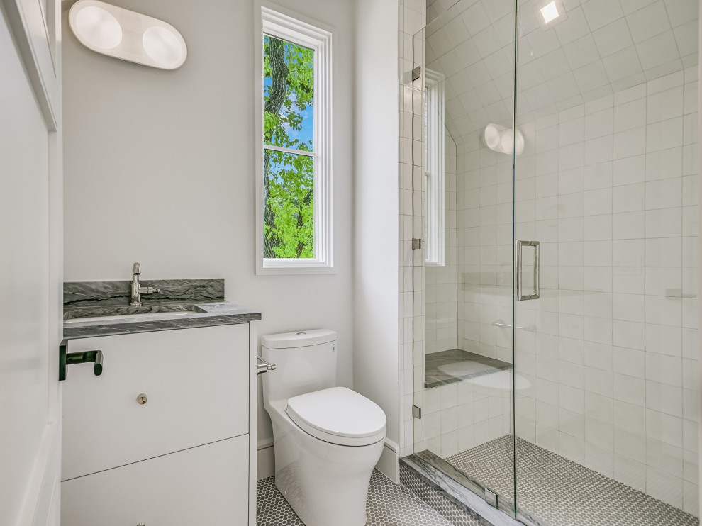Example of a transitional bathroom design in Austin
