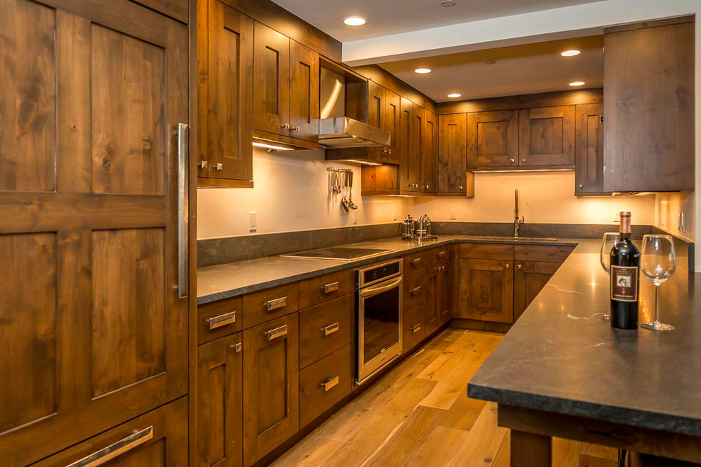 Kitchen - transitional kitchen idea in Denver with beaded inset cabinets
