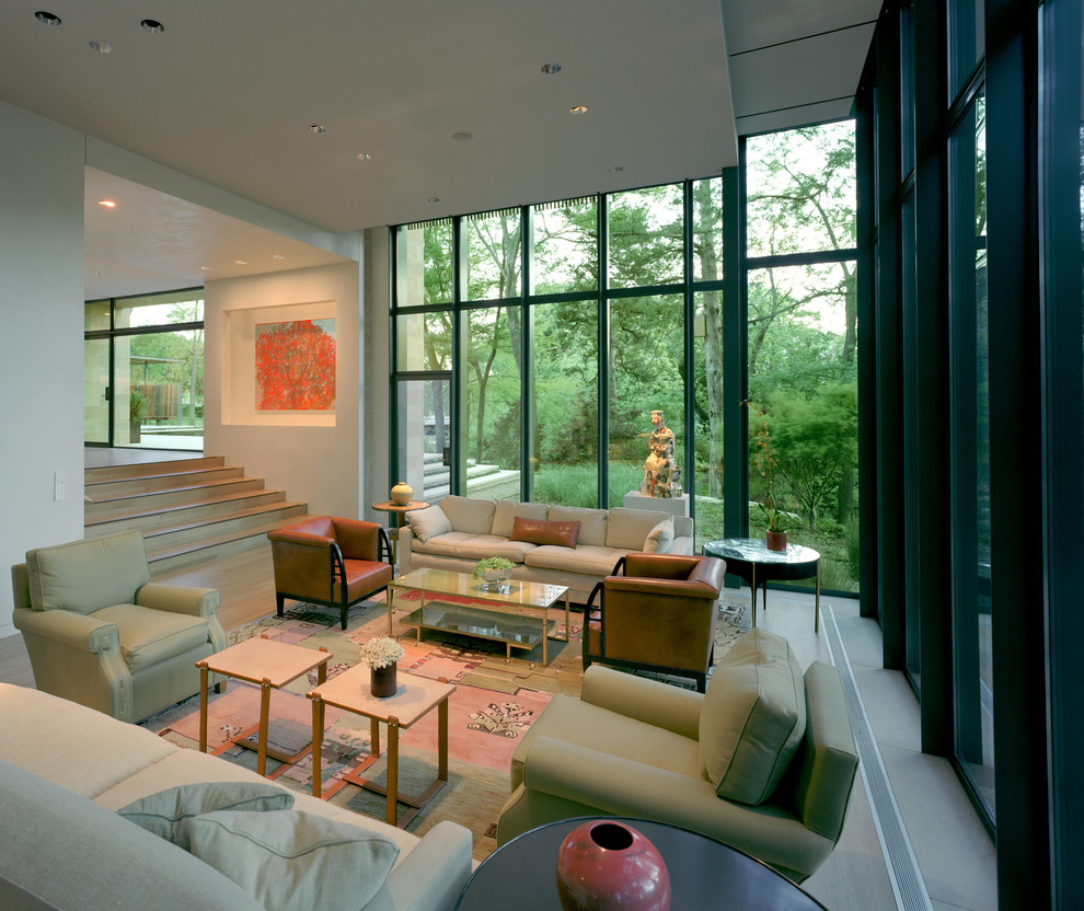 Design ideas for a modern open concept living room in Dallas with white walls and light hardwood floors.