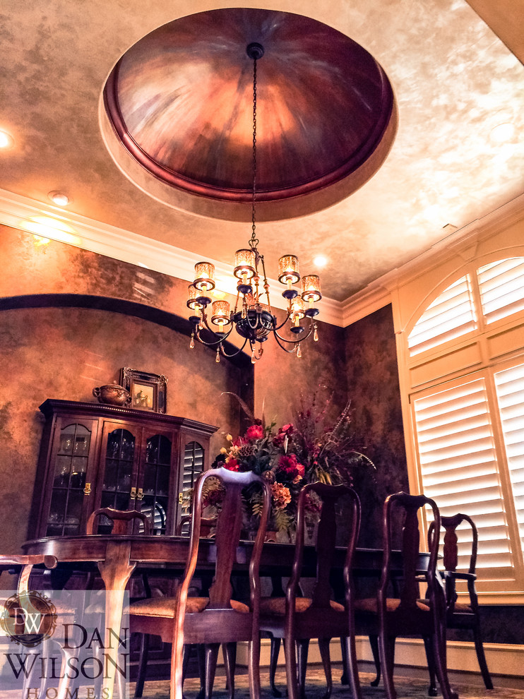Large traditional separate dining room in Austin with multi-coloured walls, dark hardwood floors and no fireplace.