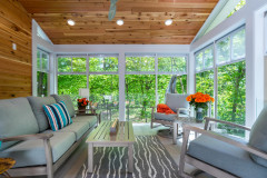 Screened-In Porch With Woodland Views Bridges the Seasons