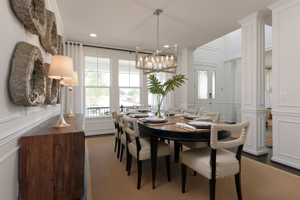 Inspiration for a large transitional separate dining room in DC Metro with white walls, vinyl floors, no fireplace and brown floor.