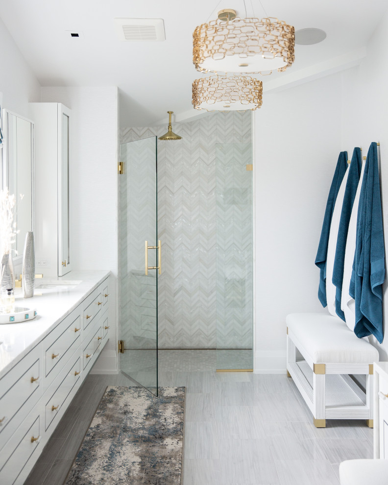 Beach style bathroom in Other with shaker cabinets, white cabinets, a curbless shower, gray tile, mosaic tile, white walls, an undermount sink, grey floor, a hinged shower door, white benchtops, a floating vanity and vaulted.