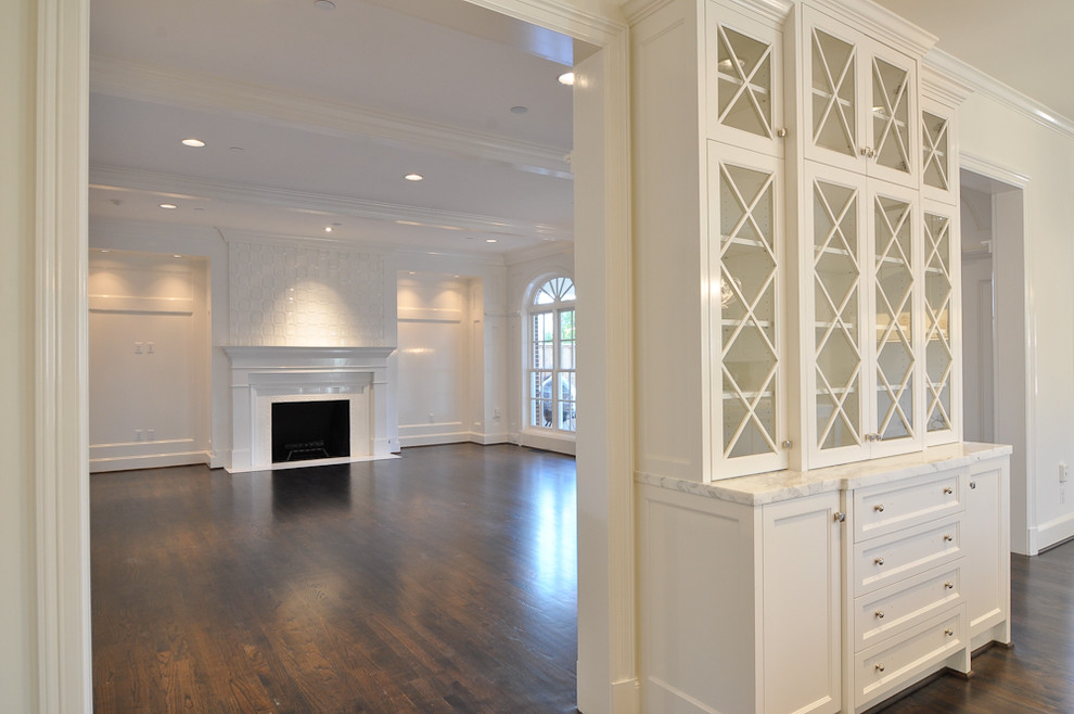 Photo of a transitional home design in Dallas.