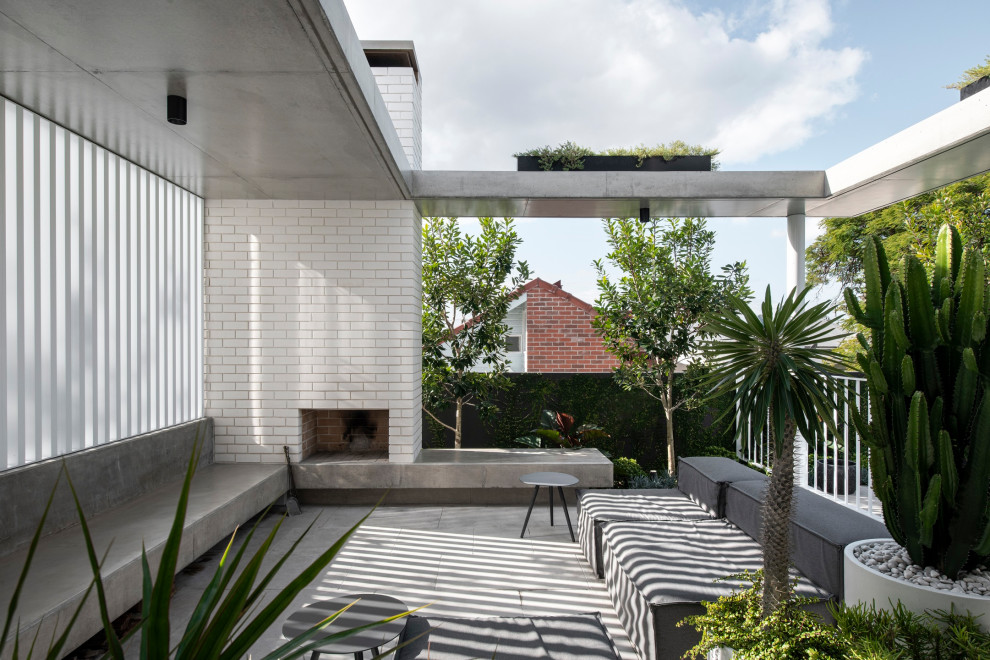 Ispirazione per un patio o portico minimal