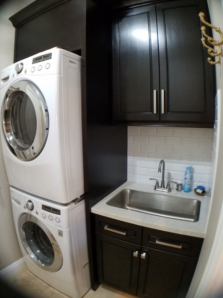 Example of a transitional laundry room design in Phoenix