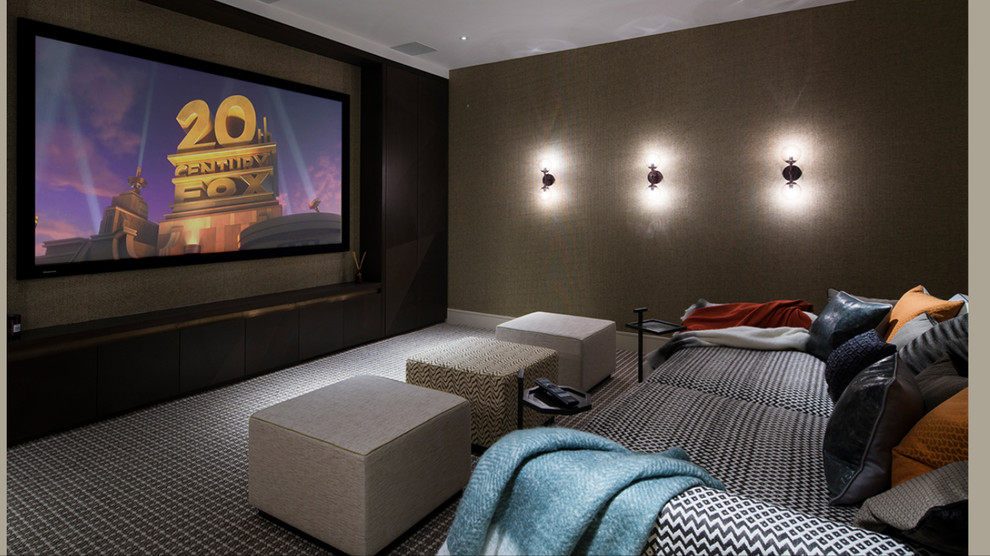 Inspiration for a mid-sized contemporary enclosed home theatre in London with brown walls, carpet and a projector screen.