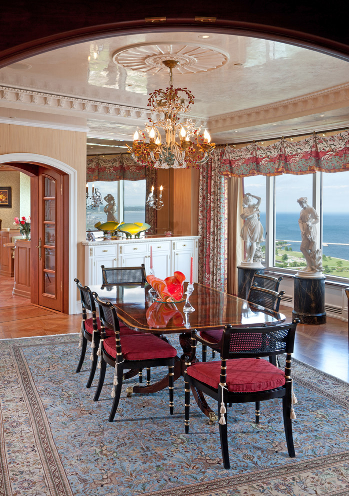 This is an example of a mediterranean dining room in Milwaukee with medium hardwood floors.