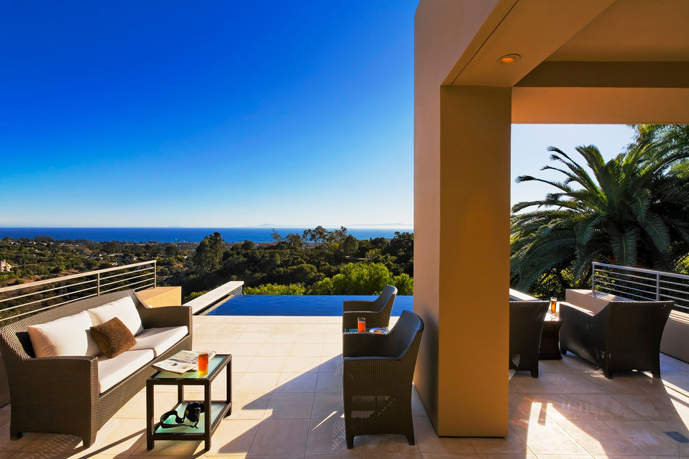 Inspiration for a contemporary rectangular infinity pool in Santa Barbara.