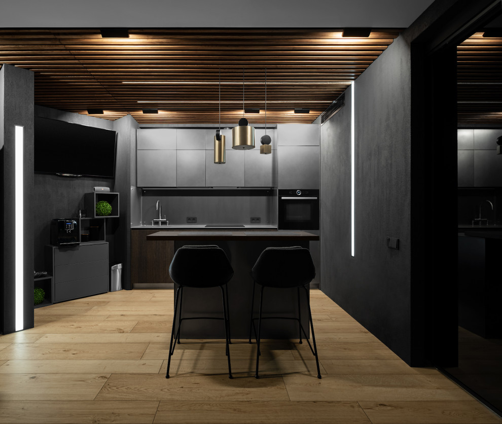 This is an example of a mid-sized contemporary kitchen in Moscow with porcelain floors.