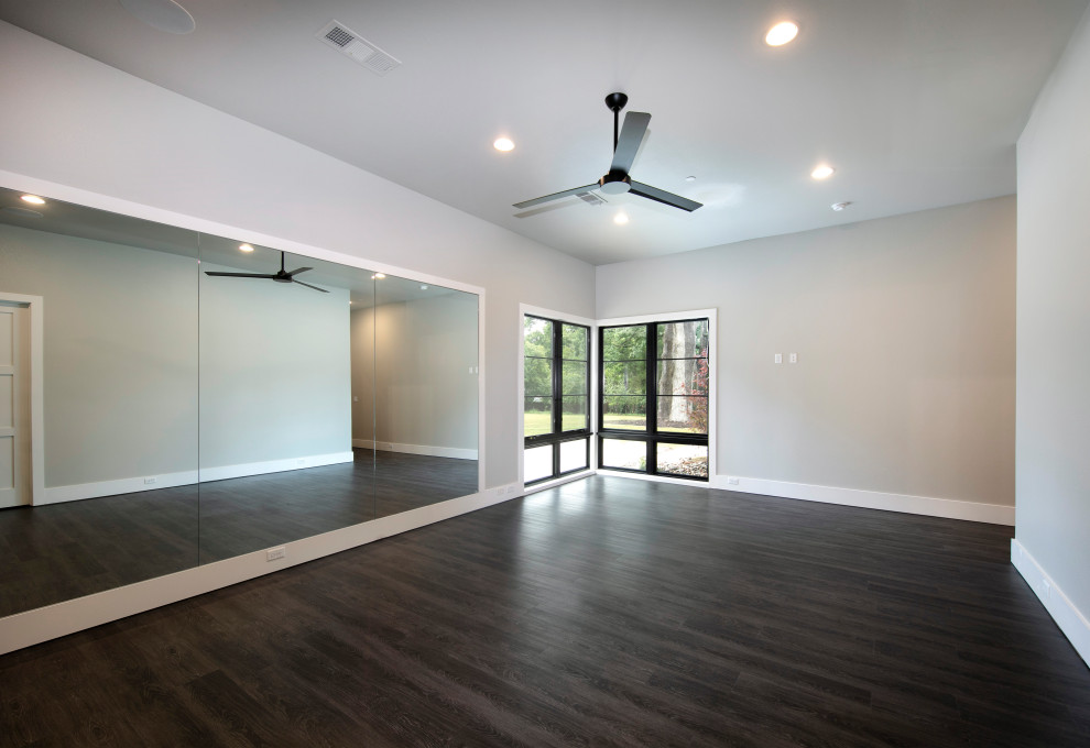 This is an example of a large transitional multipurpose gym in Dallas.