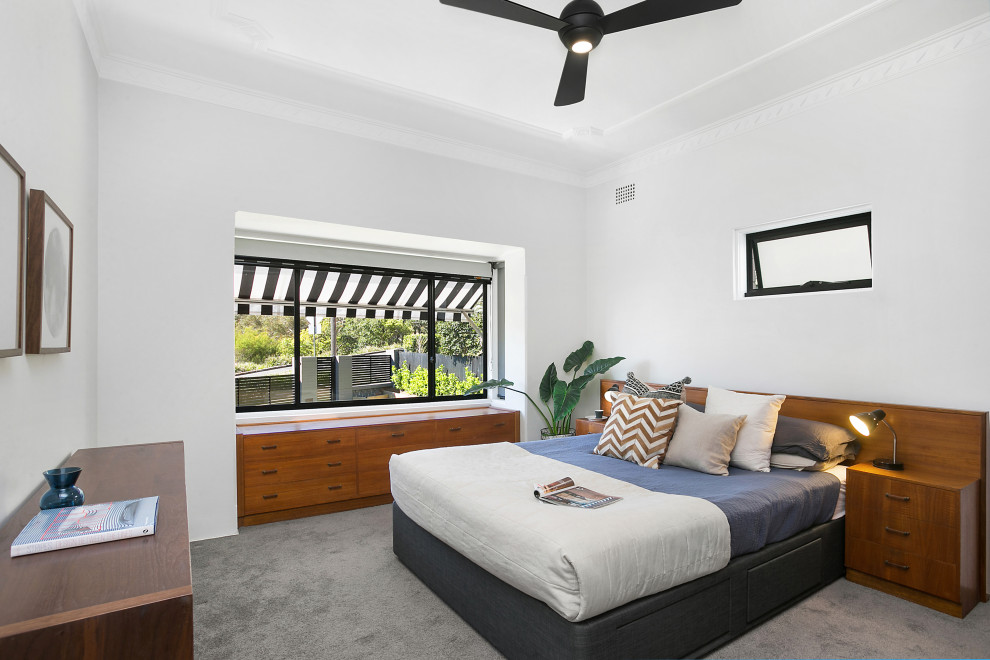 Inspiration for a contemporary master bedroom in Sydney with white walls, carpet, no fireplace and beige floor.