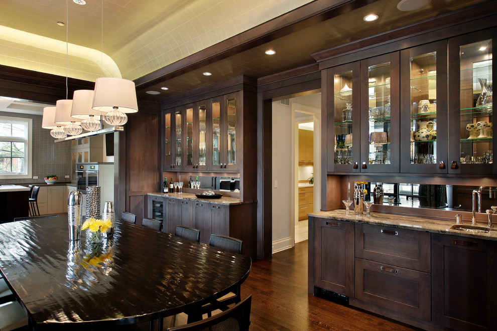 Design ideas for a large transitional separate dining room in Chicago with brown walls and dark hardwood floors.