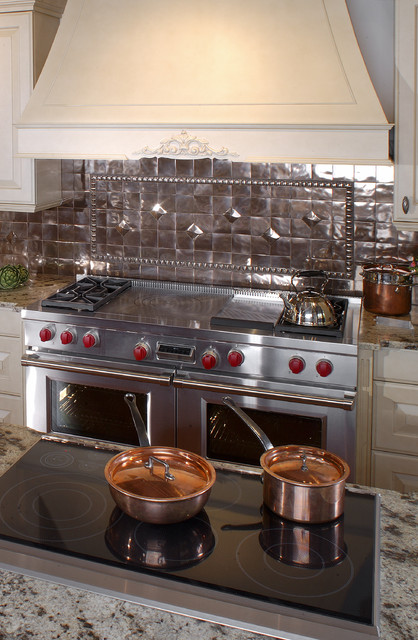 Electric Wolf Cooktop With Copper Backsplash Traditional