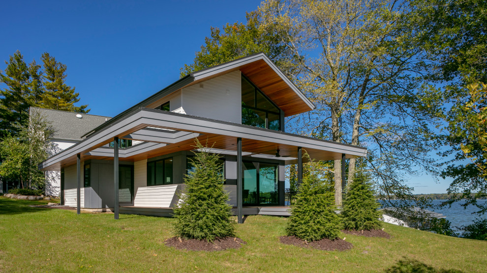 Inspiration for a modern house exterior in Grand Rapids.