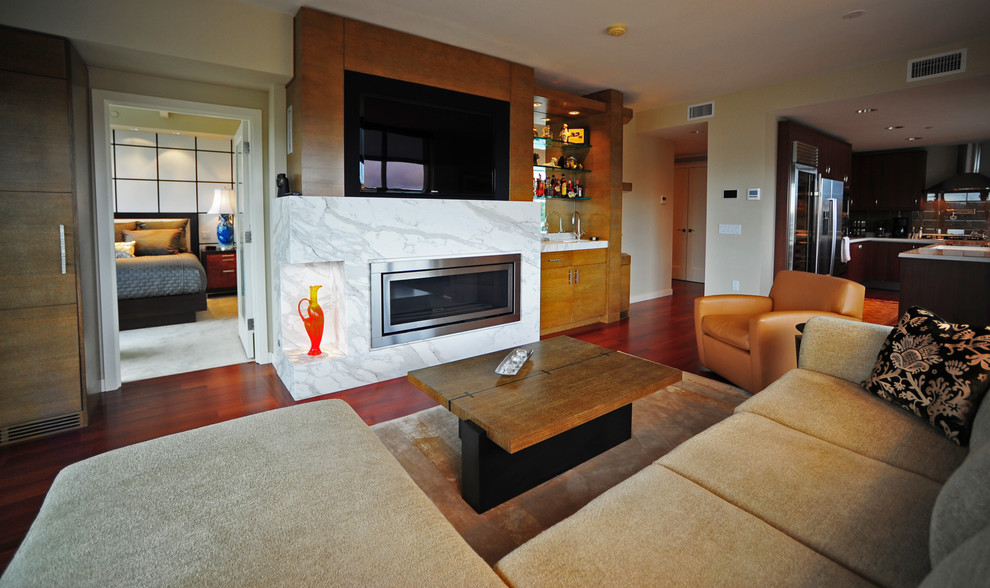 Inspiration for a contemporary living room in Seattle with a ribbon fireplace and a built-in media wall.