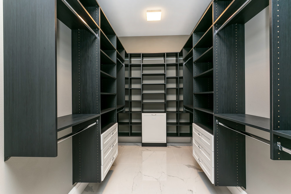 Inspiration for a large contemporary gender-neutral walk-in wardrobe in Seattle with shaker cabinets, marble floors and white floor.