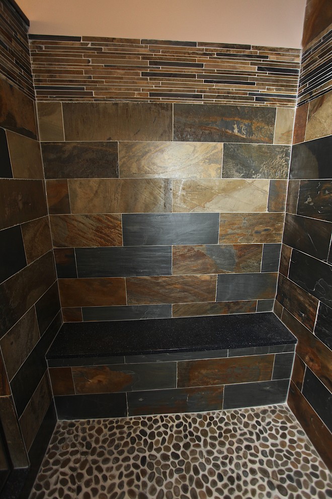Home design - large rustic master slate tile brown floor home design idea in Indianapolis with brown cabinets, beige walls and an undermount sink