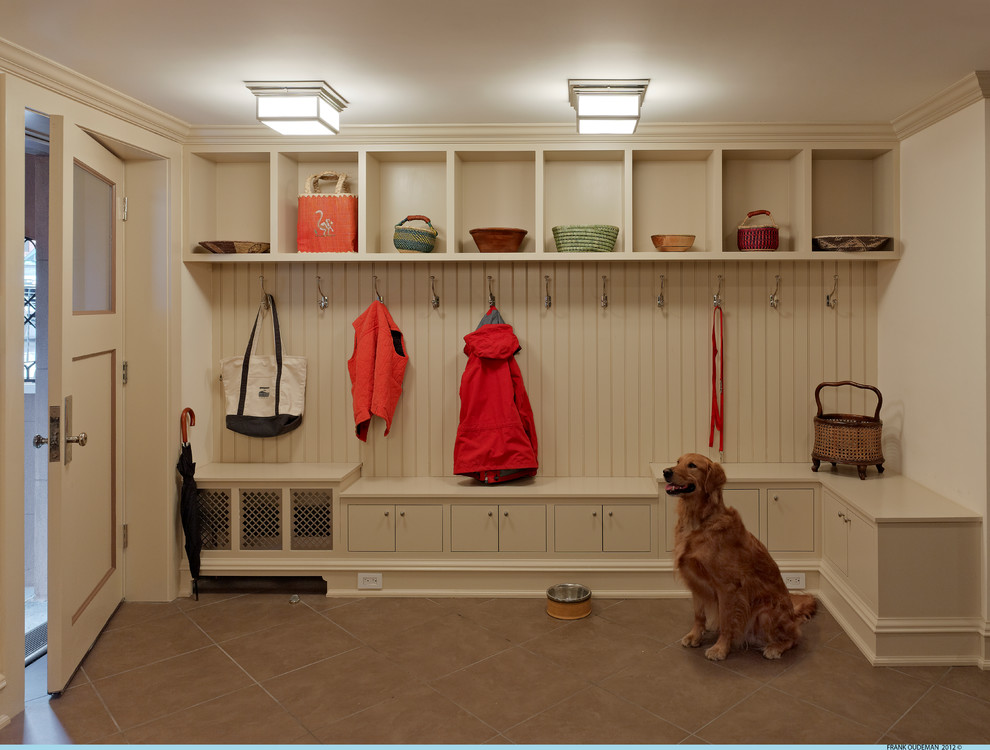 Mid-sized contemporary mudroom in New York with beige walls, a pivot front door, a white front door and beige floor.