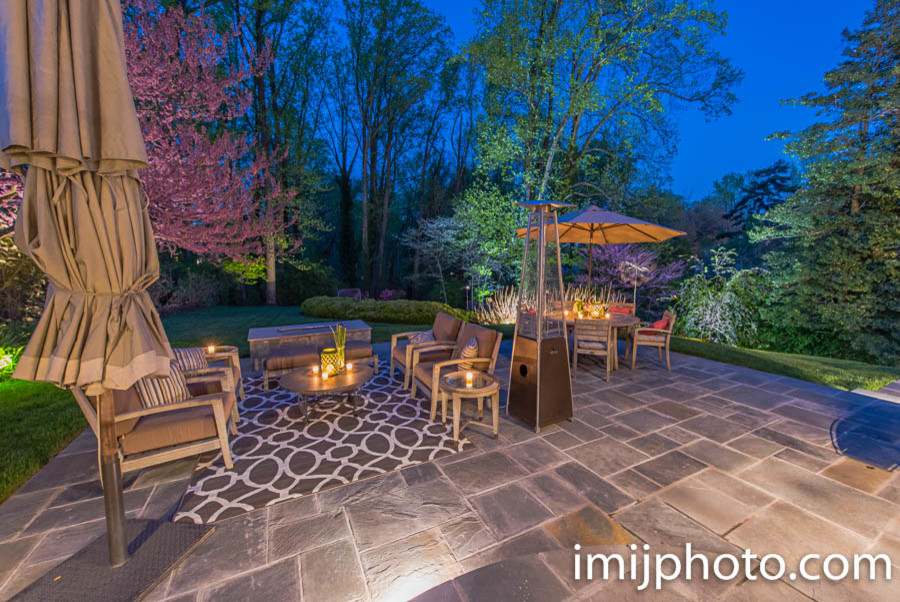This is an example of a backyard patio in DC Metro with natural stone pavers.