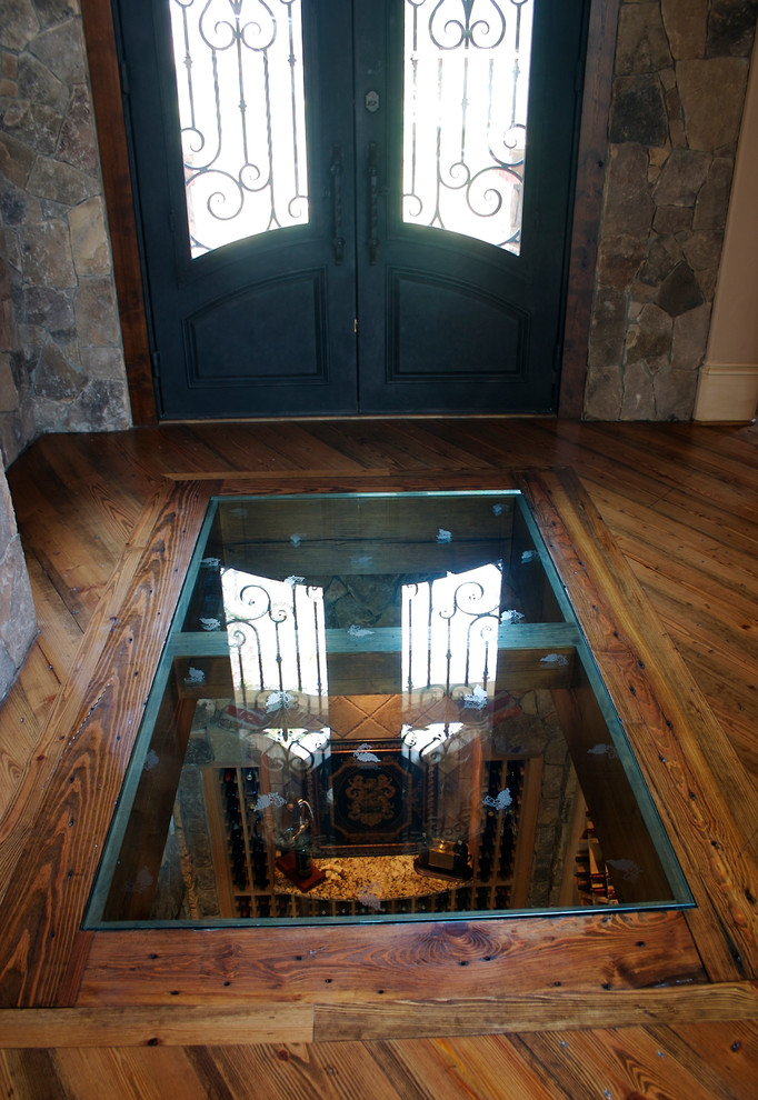 Photo of a traditional wine cellar in Charlotte.