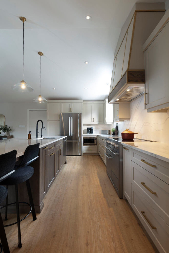Example of a transitional kitchen design in Toronto