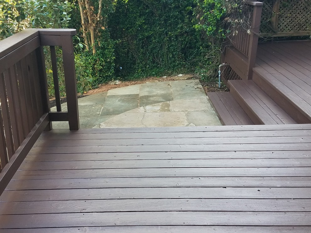 Mid-sized transitional backyard deck photo in Austin with no cover