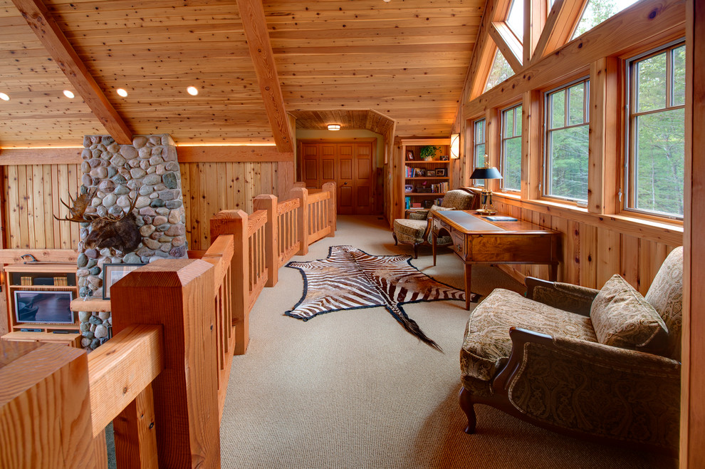 Mid-sized country loft-style family room in Other with brown walls, carpet, no fireplace, no tv and beige floor.
