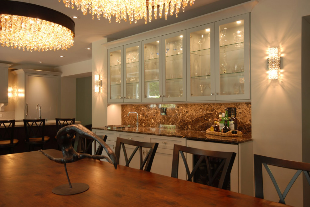 Inspiration for a mid-sized transitional medium tone wood floor and brown floor great room remodel