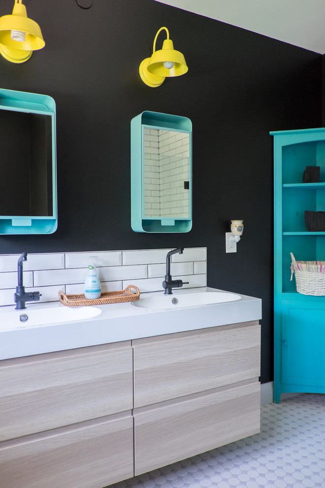 Inspiration for a contemporary kids bathroom in Toronto with flat-panel cabinets, ceramic tile, black walls, ceramic floors, light wood cabinets, white tile, an integrated sink, white floor and white benchtops.