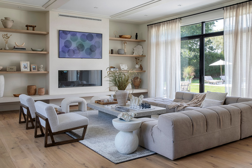 Example of a trendy living room design in New York