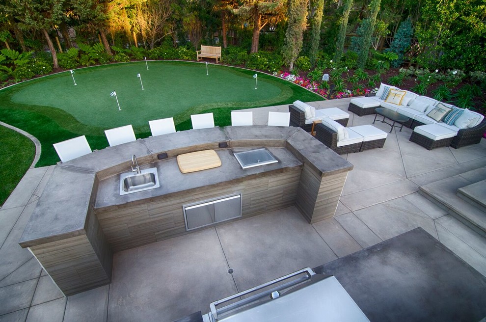 Inspiration for a contemporary backyard patio in San Diego with an outdoor kitchen and no cover.