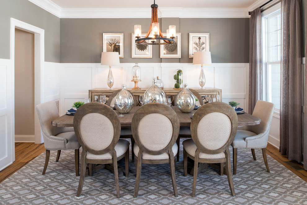 Design ideas for a traditional separate dining room in DC Metro with grey walls and medium hardwood floors.