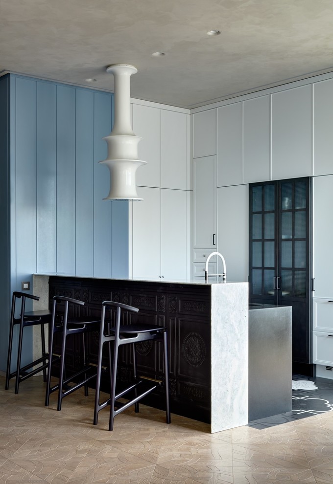 Photo of a contemporary kitchen in Moscow with beaded inset cabinets and a peninsula.