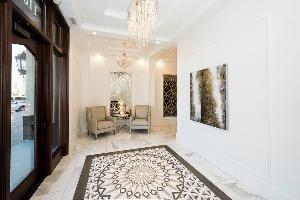 Single front door - transitional marble floor and white floor single front door idea with white walls and a dark wood front door