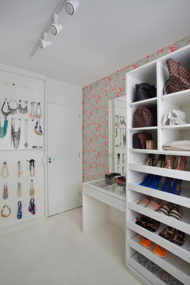 Photo of a small modern storage and wardrobe in Other with carpet.