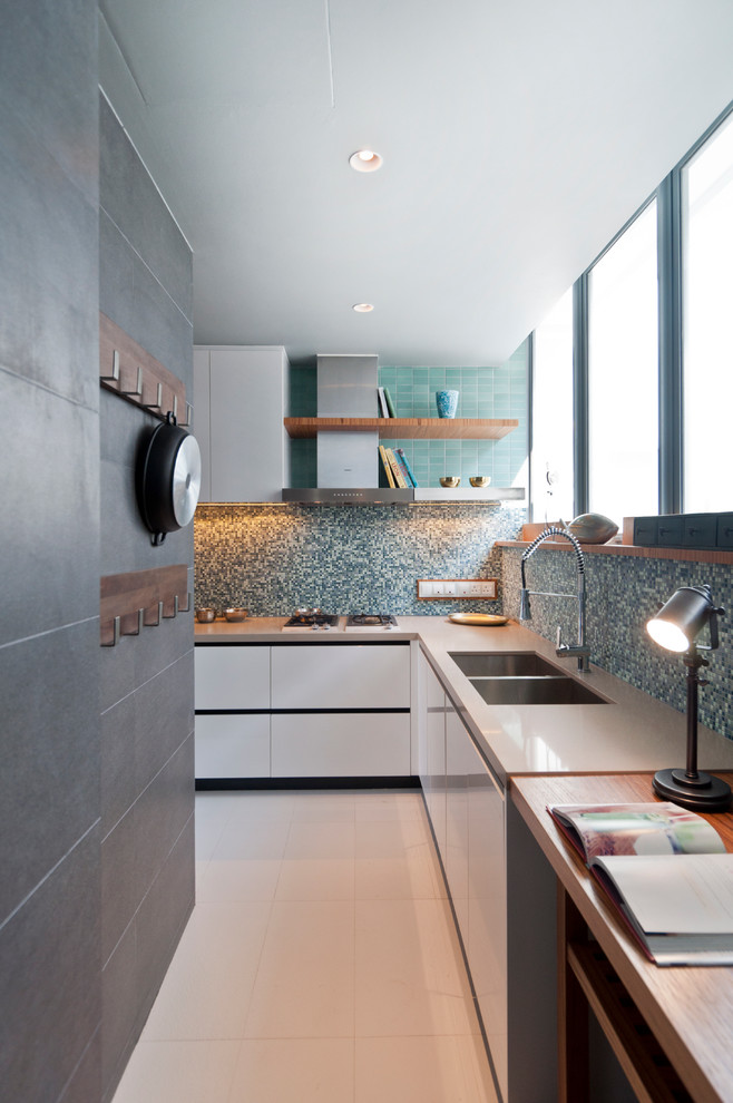 Photo of a contemporary kitchen in Singapore.